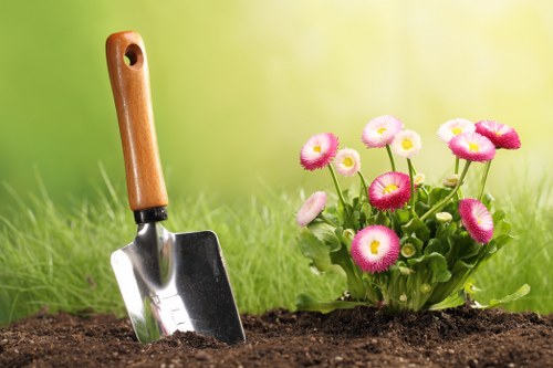 Professional landscapers designing a garden layout in Barking